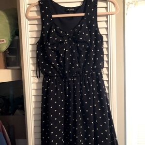 Blue and white polka dotted dress.